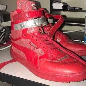 Women’s Puma high top sneakers with silver accent